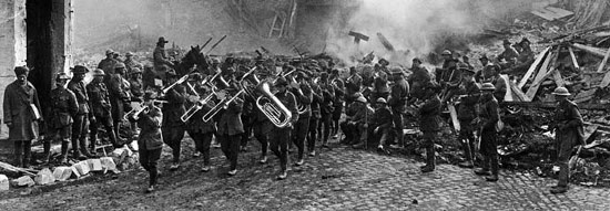 The Band of the 5th Australian Infantry Brigade, led by Bandmaster Sergeant A Peagam of the 19th Battalion