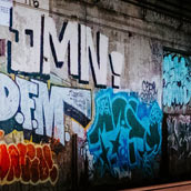 ‘Railway beside graffiti wall’ photo by Malcolm Lightbody